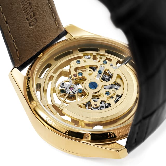 Motus | Silver-Tone Automatic Skeleton Watch With Black Leather Strap